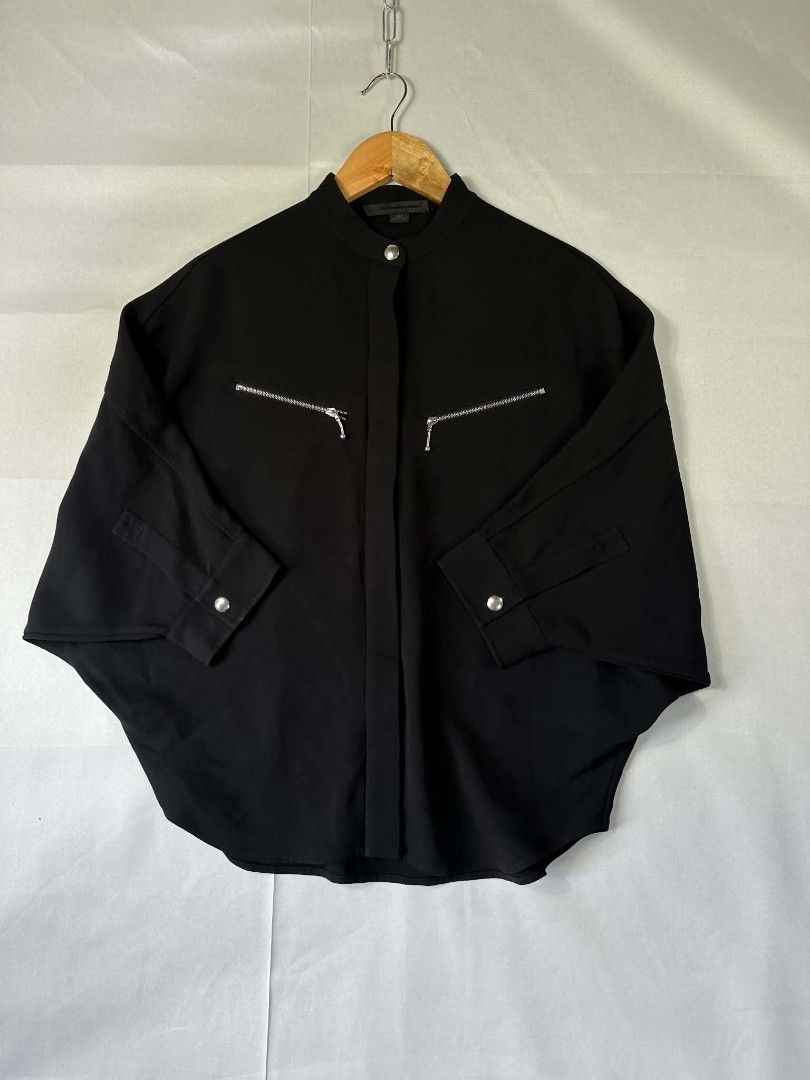 Alexanderwang Batwing Type Shirt (Category: Others Tops) located in Caloocan City. Submitted by zealbear_441c38 (Listing ID 1470979381, Image 1). Description: Title - Alexander Wang Model/Name - Size on Tag - O Conditiion - Excellent as new Dimension (WxLxH) - 25 inches length Category- Casual/Formal Fitting - Loose Made in - China Material - Color - Black Design - Batwing Style Year - Inclusion - None Note - All sales are final, Please check det