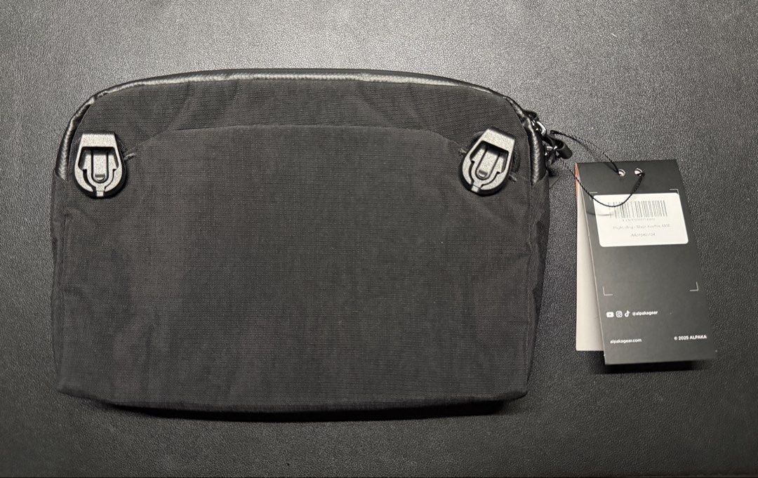 Alpaka Flight Sling 2L Axoflux 400D (Category: Sling Bags) located in Cabanatuan. Submitted by quaranthingsformen (Listing ID 1470945393, Image 2). Description: Key Features • Packable and lightweight • Front zipper pocket with Mod Key Tether • Main zipper compartment • Soft-lined sleeve for iPad Mini or Nintendo Switch • Discreet rear pocket with magnetic closure • Detachable shoulder strap • YKK AquaGuard and standard zippers.