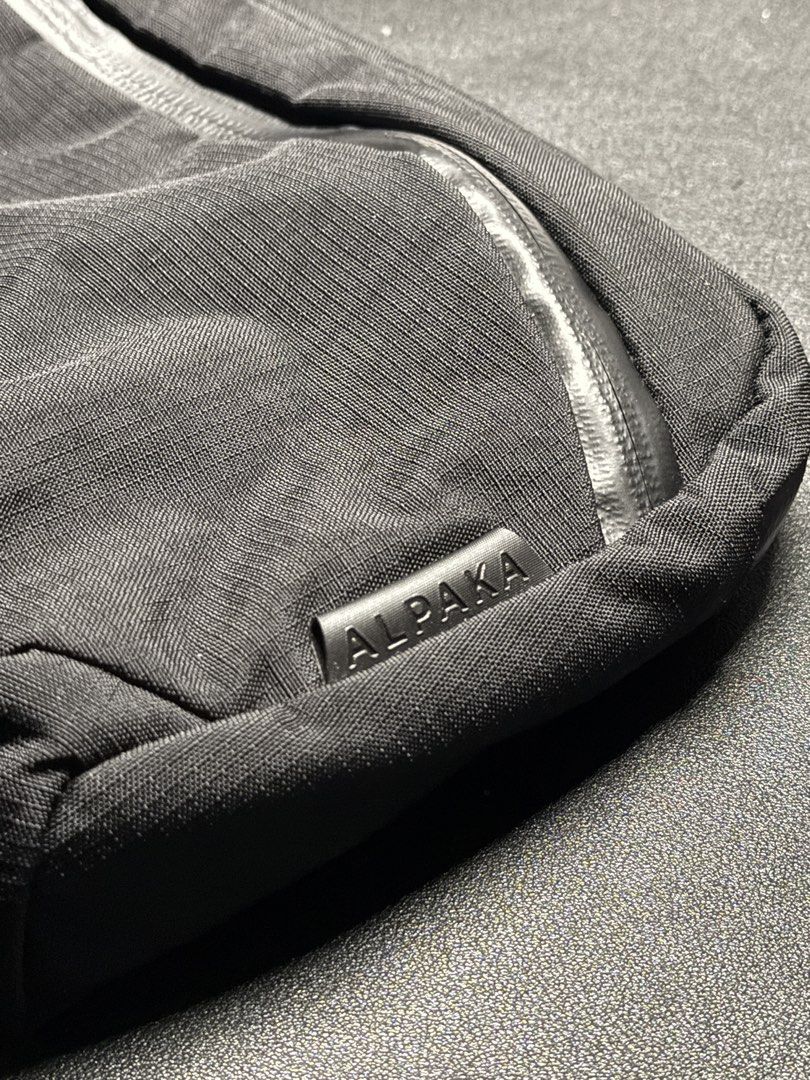 Alpaka Flight Sling 2L Axoflux 400D (Category: Sling Bags) located in Cabanatuan. Submitted by quaranthingsformen (Listing ID 1470945393, Image 3). Description: Key Features • Packable and lightweight • Front zipper pocket with Mod Key Tether • Main zipper compartment • Soft-lined sleeve for iPad Mini or Nintendo Switch • Discreet rear pocket with magnetic closure • Detachable shoulder strap • YKK AquaGuard and standard zippers.
