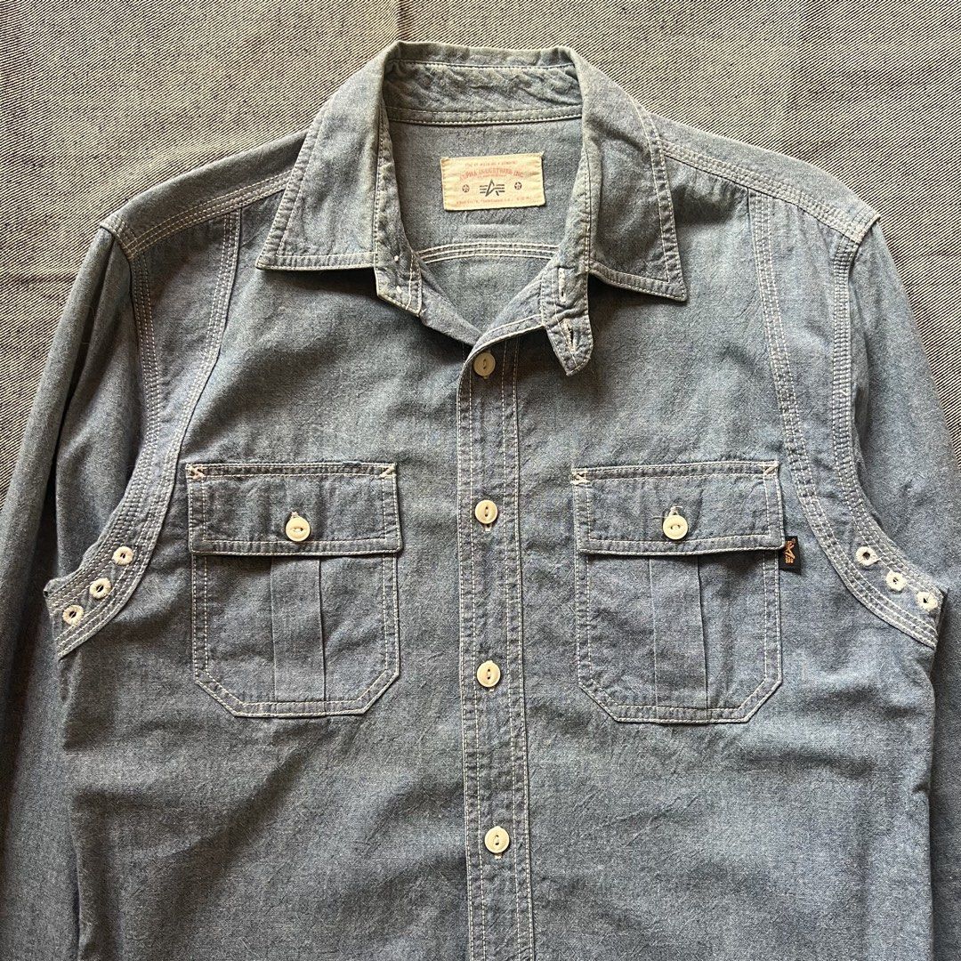 Alpha Industries Blue Chinstrap Chambray Work Shirt (Category: Formal Shirts) located in Manila. Submitted by minsanseller_madalasbuyer (Listing ID 1470976757, Image 2). Description: Alpha Industries Blue Chinstrap Chambray Work Shirt Chest - 18.5” Length - 27” (Back is 28”) Shoulder - 16” Sleeve - 25” - Light blue cotton fabric. - Reinforced white triple-stitching along the seams. - Curved back yoke, armpit vent eyelets for added breathability, 