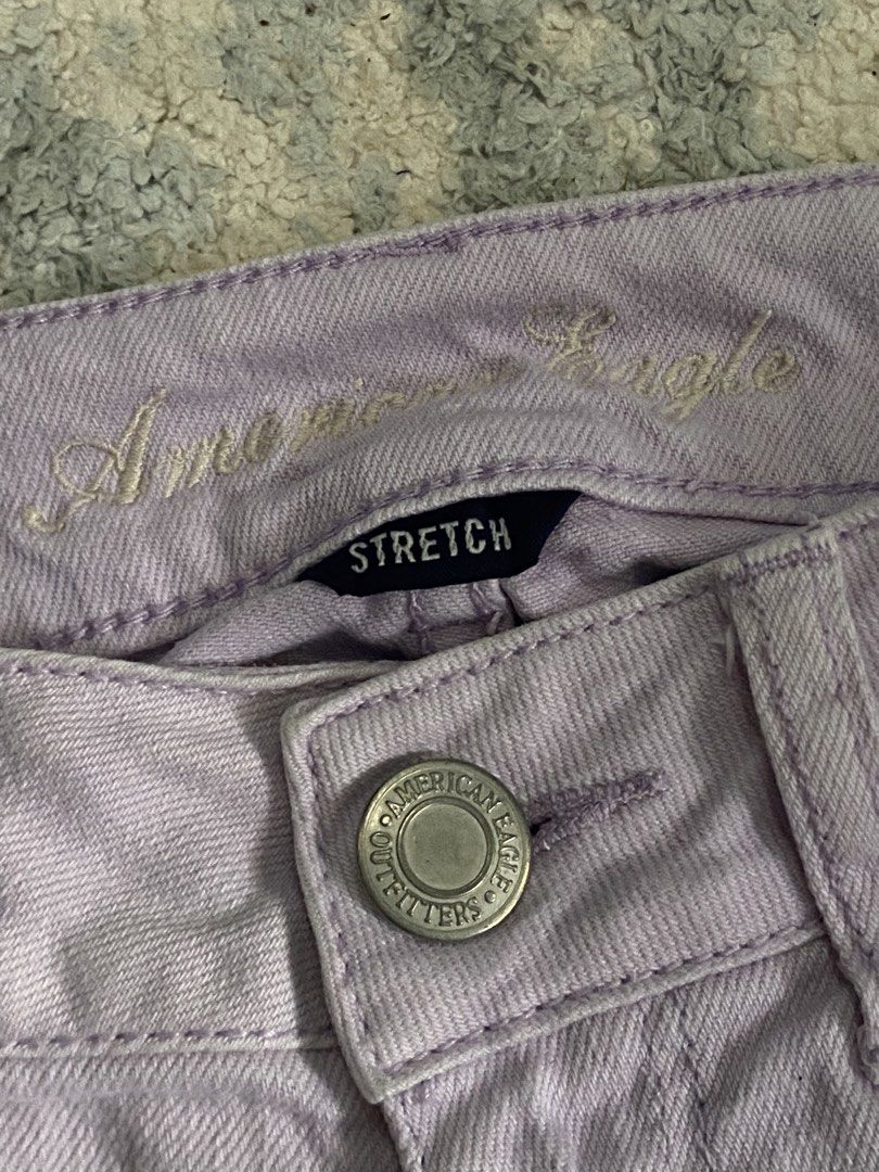American Eagle Purple Stretch Denim Shorts (Category: Shorts) located in Manila. Submitted by kuya_moto (Listing ID 1470990291, Image 3). Description: - Brand: American Eagle - Color: Light purple - Fit: Low rise with comfortable stretch fabric - Details: Frayed raw hem, branded metal button closure, and leather patch on back waistband - Special Feature: Charming white lace applique on back pockets - Shipping: Ships fast from the Philippines via 