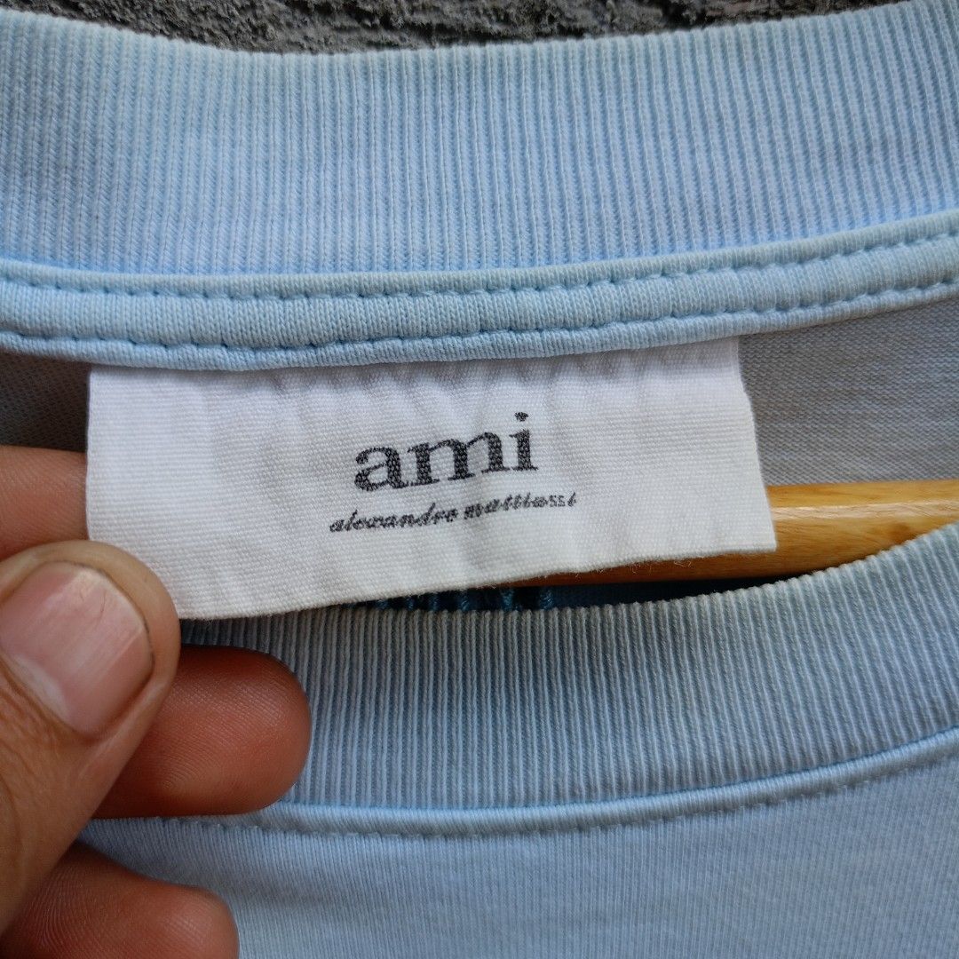 AMI (Category: Tshirts & Polo Shirts ) located in Koronadal. Submitted by thriflex.29 (Listing ID 1470946590, Image 3). Description: AMI Size: Medium Measurements: Width 20 Length 27 Condition: 9/10 - Excellent Colorate: 9.5/10 Issue: Stain & Need Wash Mine: 400.