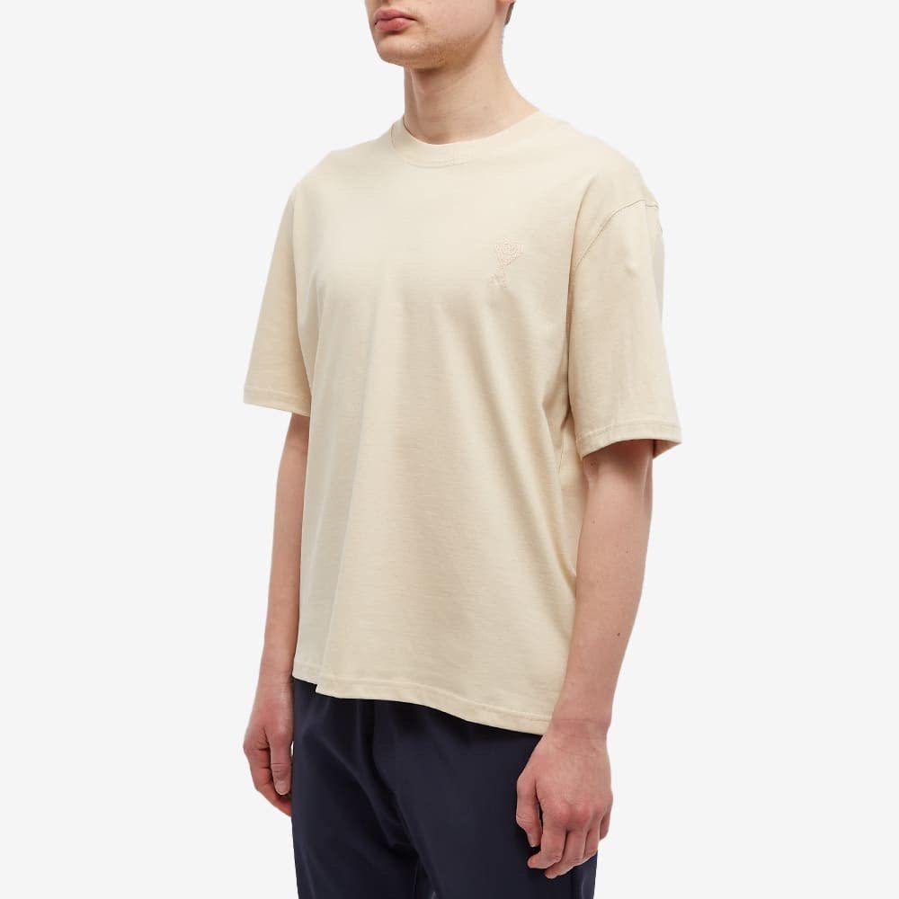 Ami Beige Tonal Logo Tee (Category: Tshirts & Polo Shirts ) located in Meycauayan. Submitted by itstimothrifts (Listing ID 1471009645, Image 1). Description: Ami Beige Tonal Logo Tee Excellent Condition Authentic No flaws M on tag fits L W 23.5 L 27 .