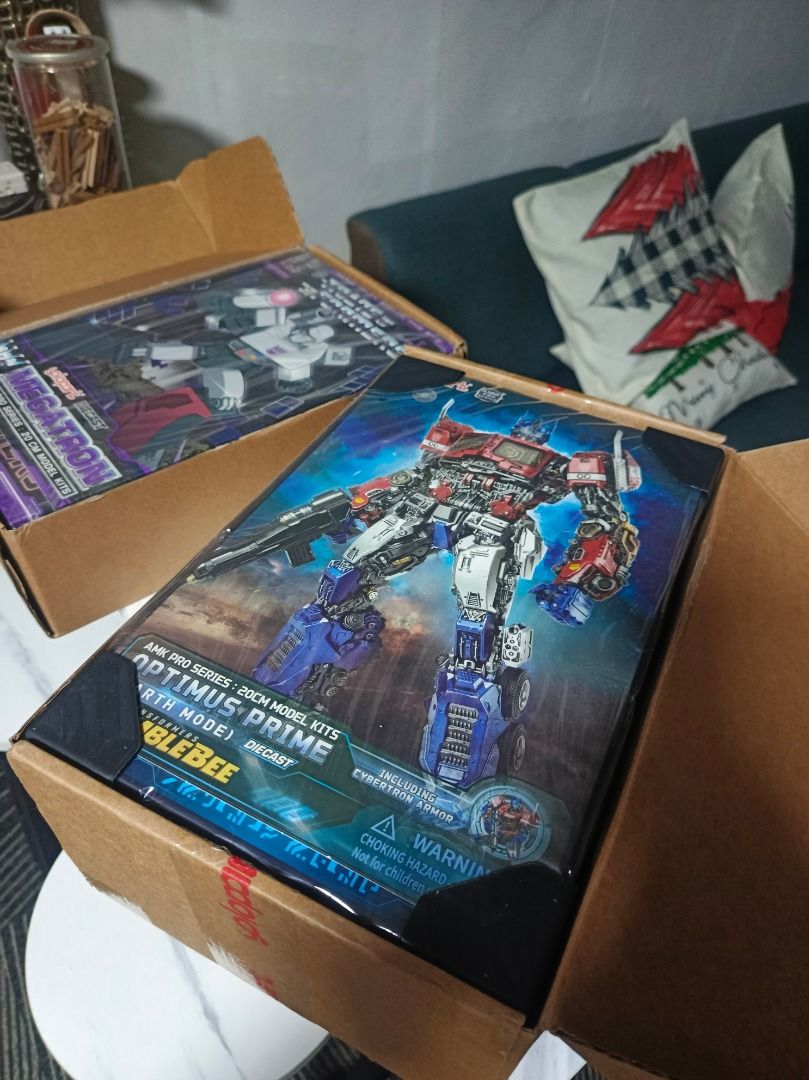 AMK Pro Series Optimus Prime Model Kit (Category: Gundam & Model Kits) located in Quezon City. Submitted by baldwin1429 (Listing ID 1471100149, Image 3). Description: - Item: AMK Pro Transformers Bumblebee Movie Optimus Prime Model Kit - Condition: Brand new, unopened box, stored properly - Height: Approx. 20cm when built - Material: Features diecast components for a premium feel - Inclusions: Cybertron armor included inside the box .