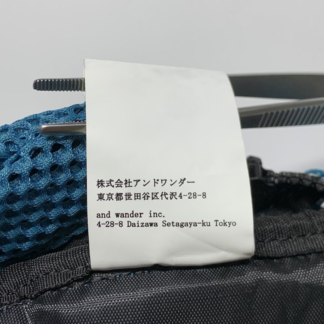 And Wander - 3D mesh waist bag (Category: Belt bags, Clutches and Pouches) located in Manila. Submitted by shottas_21 (Listing ID 1471035877, Image 3). Description: And Wander - 3D mesh waist bag CONDITION - 9/10 Made in china Width - 7” Length - 10”.
