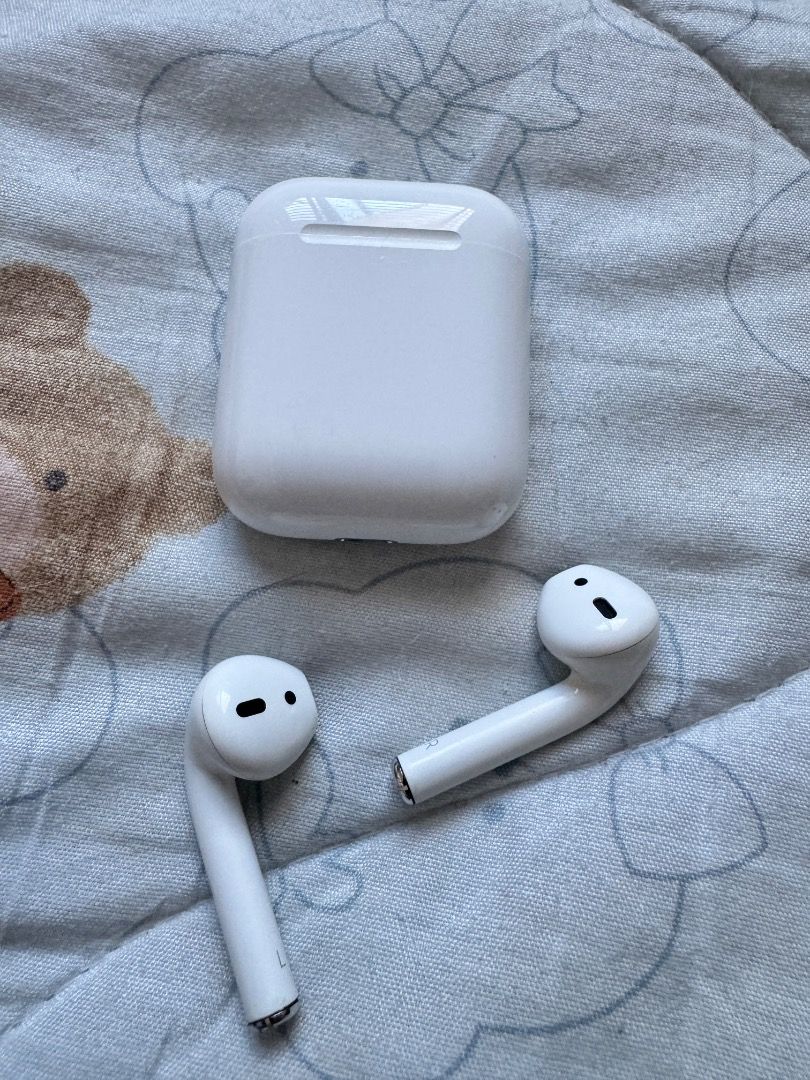 Apple AirPods (2nd gen) with charging case (Category: Headphones & Headsets) located in Taytay. Submitted by calmrabbit_b78b3f (Listing ID 1471006769, Image 2). Description: - fully functional - excellent battery life - free case - charging cable included.
