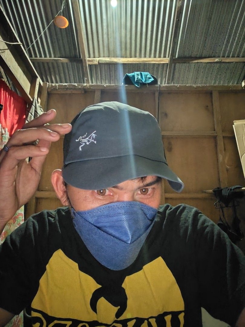 Arcteryx Calvus cap (Category: Caps & Hats) located in Roxas, Palawan. Submitted by act_thrift_palawan (Listing ID 1471040229, Image 2). Description: -need reshape - Brand: Arc'teryx - Color: Dark grey with white side logo embroidery - Size: S-M - Material/D Design: Breathable mesh back panels, adjustable strap with inner branding - Condition: Clean, great for outdoor activities or everyday wear - Origin: Made in China.