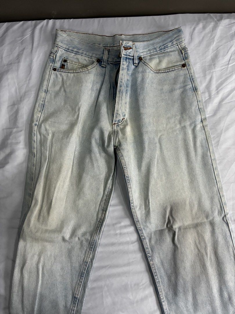 Armani Jeans Light Wash Denim (Category: Jeans) located in Manila. Submitted by nikkoour (Listing ID 1470934512, Image 1). Description: - Brand: Armani Jeans (Est. 1981 line) - Origin: Made in Italy - Wash: Light wash with subtle distressing - Fit: Casual straight leg - Details: Button fly, metal rivets, classic back pocket stitching with eagle logo - Branding: Iconic leather patch on the back waistband - Condition: Great vintage look -32.