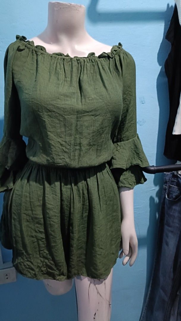 Army Green off-shoulder romper with pockets medium large (Category: Rompers) located in Quezon City. Submitted by davidclothing (Listing ID 1470953685, Image 2). Description: - Color: Green - Style: Off-shoulder romper with tiered bell sleeves - Fit: Comfortable elastic waistband, fits medium to large frames - Features: Comes with functional pockets - Fabric: Lightweight and breathable for warm weather.