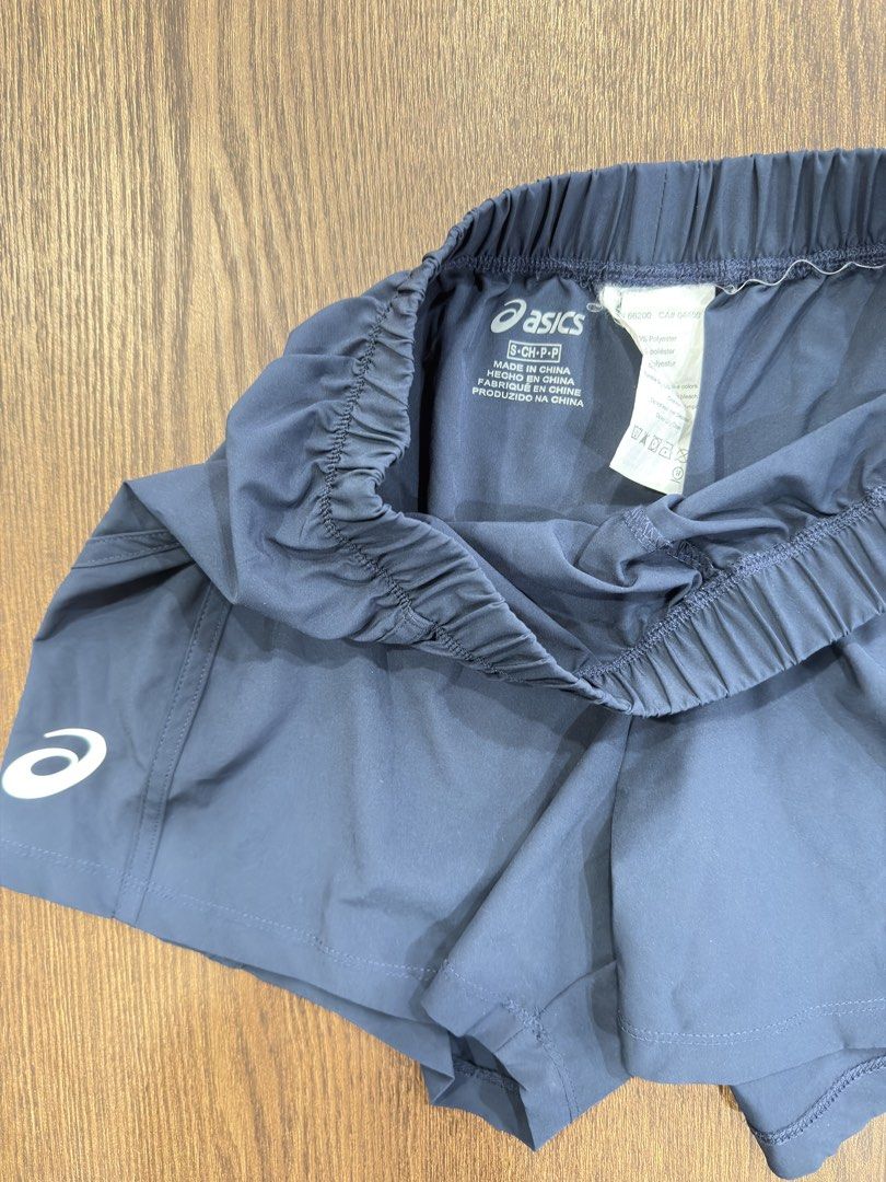 Asics Running Shorts Navy Blue Size S (Category: Activewear) located in Angeles City. Submitted by beyond.this (Listing ID 1470982150, Image 3). Description: - Brand: Asics - Color: Navy Blue - Size: Small - Material: Lightweight, quick-drying polyester - Features: Elastic waistband with comfortable stretch and Asics logo on lower left leg - Condition: Great workout gear with clean interior care tag - Origin: Made in China.