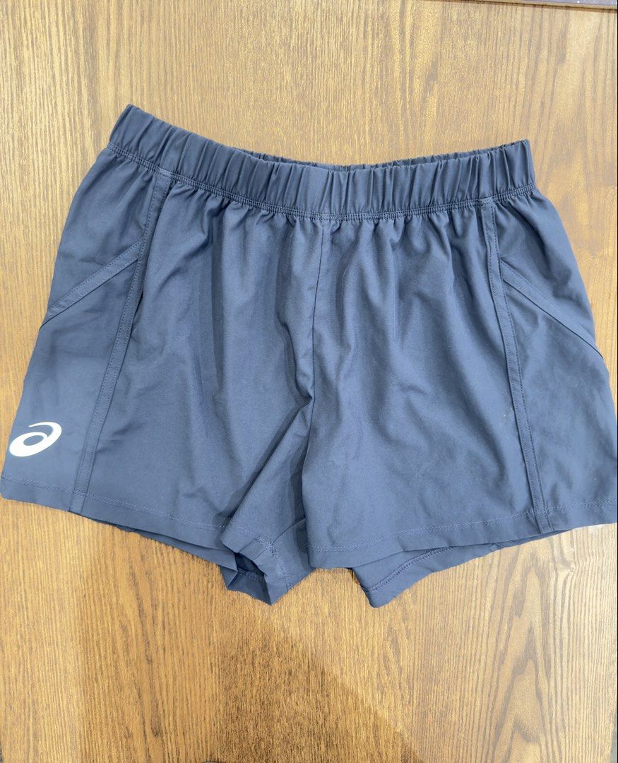 Asics Running Shorts Navy Blue Size S (Category: Activewear) located in Angeles City. Submitted by beyond.this (Listing ID 1470982150, Image 1). Description: - Brand: Asics - Color: Navy Blue - Size: Small - Material: Lightweight, quick-drying polyester - Features: Elastic waistband with comfortable stretch and Asics logo on lower left leg - Condition: Great workout gear with clean interior care tag - Origin: Made in China.
