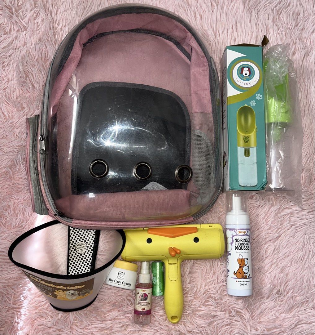Assorted Items for Pets (Category: Homes & Other Pet Accessories) located in Makati City. Submitted by shophallyuwantph (Listing ID 1470986595, Image 1). Description: FOR SALE: ASSORTED ITEMS FOR PETS ₱550 take all • bag carrier - pink (needs wash / 2-3 times used only) • pet travel bottle (brandnew) • pet collar cone • cream for pet skin (small amount used only) • pet perfume - strawberry scent (almost full) • 10-15 pcs. plastic for litter • bru