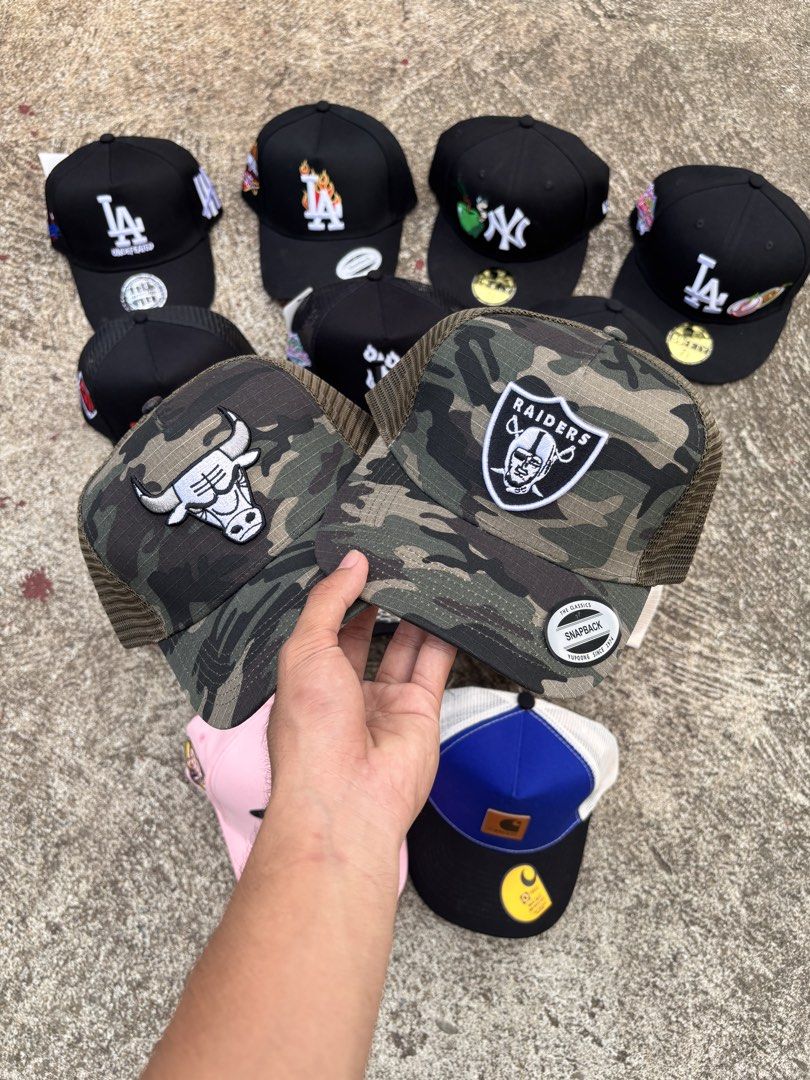 Assorted MLB Fitted and Snapback Caps (Category: Caps & Hats) located in Kalamansig. Submitted by jamesthrifted (Listing ID 1471058730, Image 1). Description: - Massive hat collection: NY Yankees, LA Dodgers, Chicago Bulls, Las Vegas Raiders, & Arizona Diamondbacks - Styles: Fitted 59FIFTY and adjustable mesh snapbacks - Unique details: Special side embroidery including apples, roses, and flames - Perfect for daily streetwear fits and cap collect