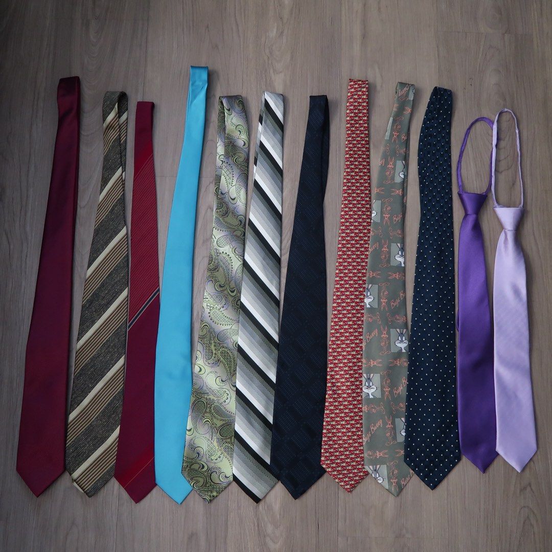 Assorted Neckties Lot Designer Brands Various Styles (Category: Ties) located in Manila. Submitted by mixi_lexi (Listing ID 1471043890, Image 3). Description: - Bundle of assorted designer neckties (Givenchy, Brioni, Perry Ellis, Pierre Cardin) - Variety of patterns: stripes, paisley, polka dots, and novelty prints - Colors include burgundy, teal, green, grey, navy, red, purple, and lavender - Standard lengths and widths - Ideal for work, formal 