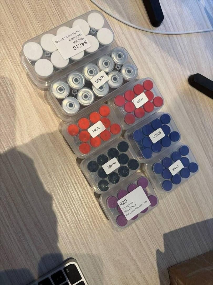 Assorted Research Peptide Chemical Vials and Kits (Category: Medical Supplies & Tools) located in Caloocan City. Submitted by juaneossi (Listing ID 1471114357, Image 2). Description: - Complete set of research chemical vials in organized boxes - Includes 9 labeled variants: NJ500, TR30, TR20, SK5, BB10, H24, TR60, Ada10, and RT20 - Each box contains 10 individual small vials featuring color-coded caps - Neatly arranged inside clear plastic storag
