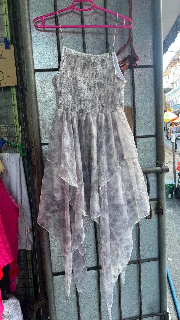 Asymmetrical Ruffle Dress (Category: Dresses) located in Manila. Submitted by adriane.s_lootz (Listing ID 1471048446, Image 3). Description: - Brand: Haute Hippie - Size: S Grey tie-dye Spag smocked bodice, dramatic layered ruffles, and asymmetric no issue need wash Excellent condition .