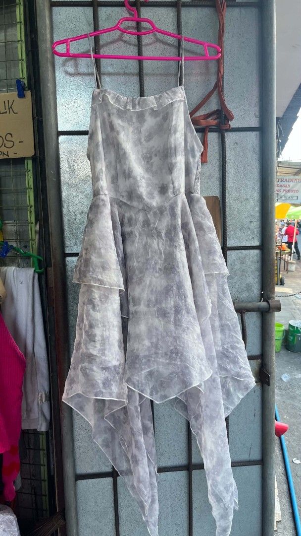 Asymmetrical Ruffle Dress (Category: Dresses) located in Manila. Submitted by adriane.s_lootz (Listing ID 1471048446, Image 2). Description: - Brand: Haute Hippie - Size: S Grey tie-dye Spag smocked bodice, dramatic layered ruffles, and asymmetric no issue need wash Excellent condition .