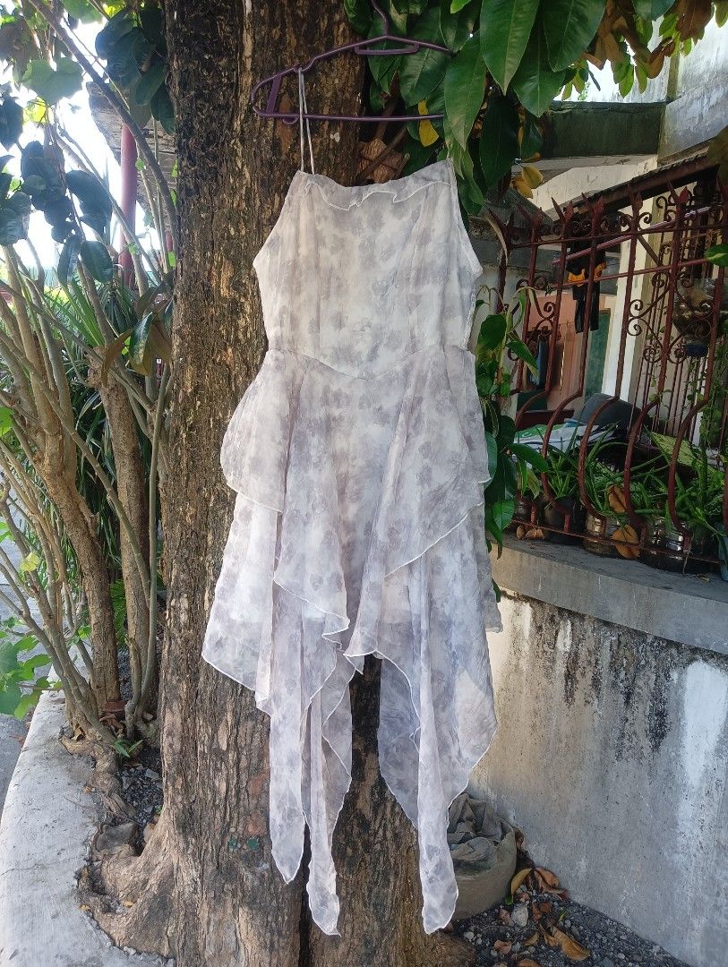 Asymmetrical Ruffle Dress (Category: Dresses) located in Manila. Submitted by adriane.s_lootz (Listing ID 1471048446, Image 1). Description: - Brand: Haute Hippie - Size: S Grey tie-dye Spag smocked bodice, dramatic layered ruffles, and asymmetric no issue need wash Excellent condition .