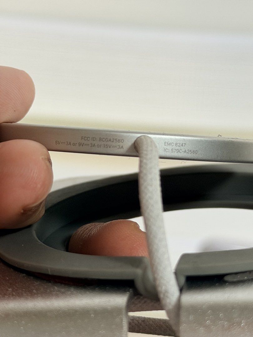 Auth Apple Magsafe Charger (Category: Chargers & Cables) located in Marikina City. Submitted by ukayshopping (Listing ID 1471012280, Image 3). Description: Rarely used. Like new. Original Apple. 1 meter cord. Inclusion: Metal holder .