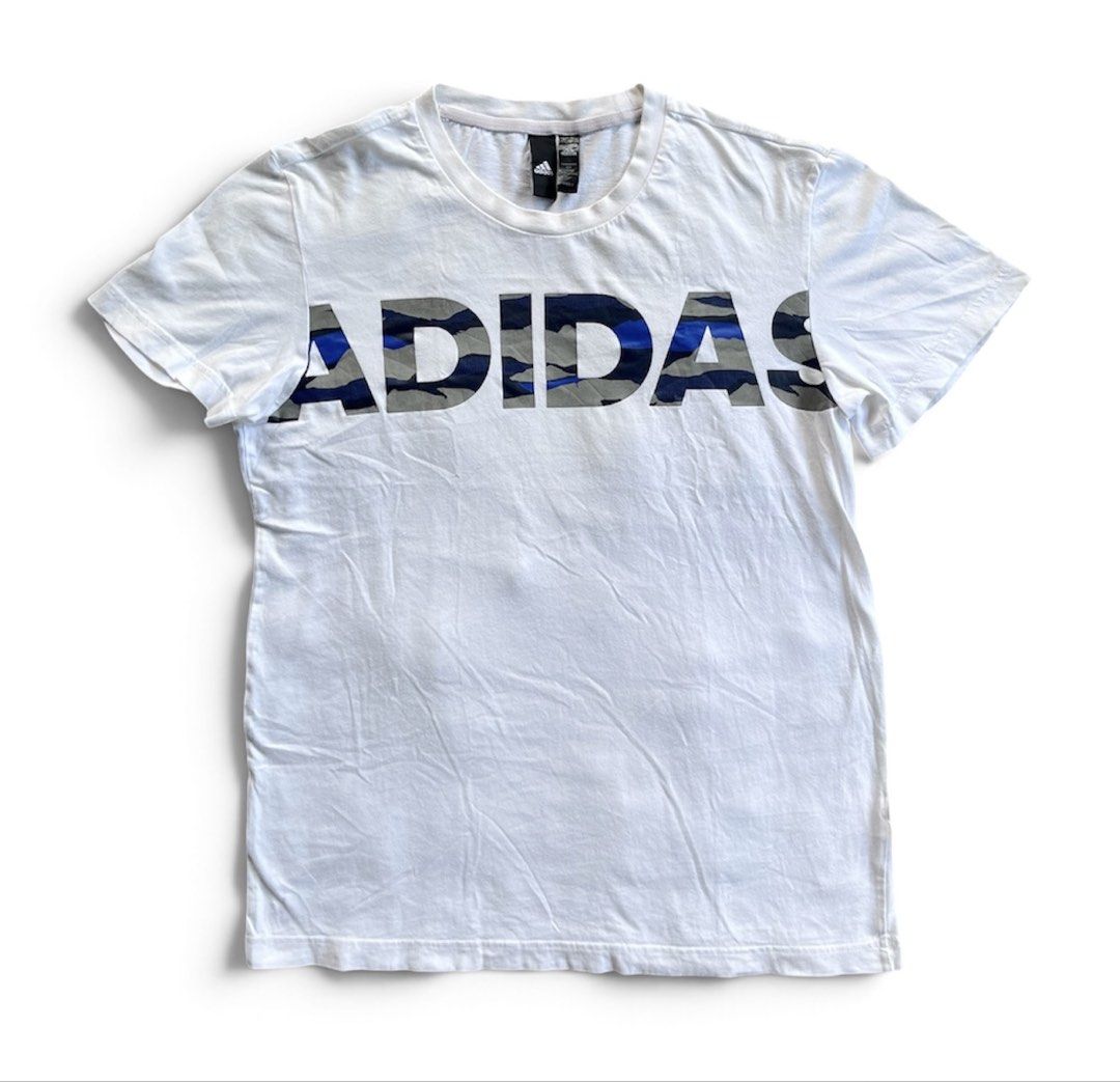 Authentic Adidas Camo-Print Big Logo Tee (Category: Tshirts & Polo Shirts ) located in Maddela. Submitted by ronb.tp (Listing ID 1471032840, Image 1). Description: Absolutely no issues / No flaws 💯 Dimes: • Width: 19 inches • Length: 26 inches Size: Fits Medium to Large.