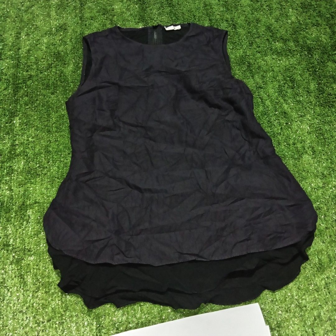Authentic Brunello Cucinelli Gauze Zip tank (Category: Luxury Apparel) located in Polomolok. Submitted by instajunk.phv2 (Listing ID 1470974618, Image 3). Description: Brunello Cucinelli wrinkled gauze zip-back tank top crafted from a lightweight crinkle fabric with a layered, flowy hem Size small 18.5*23 Good as new condition No flaws 3699php.