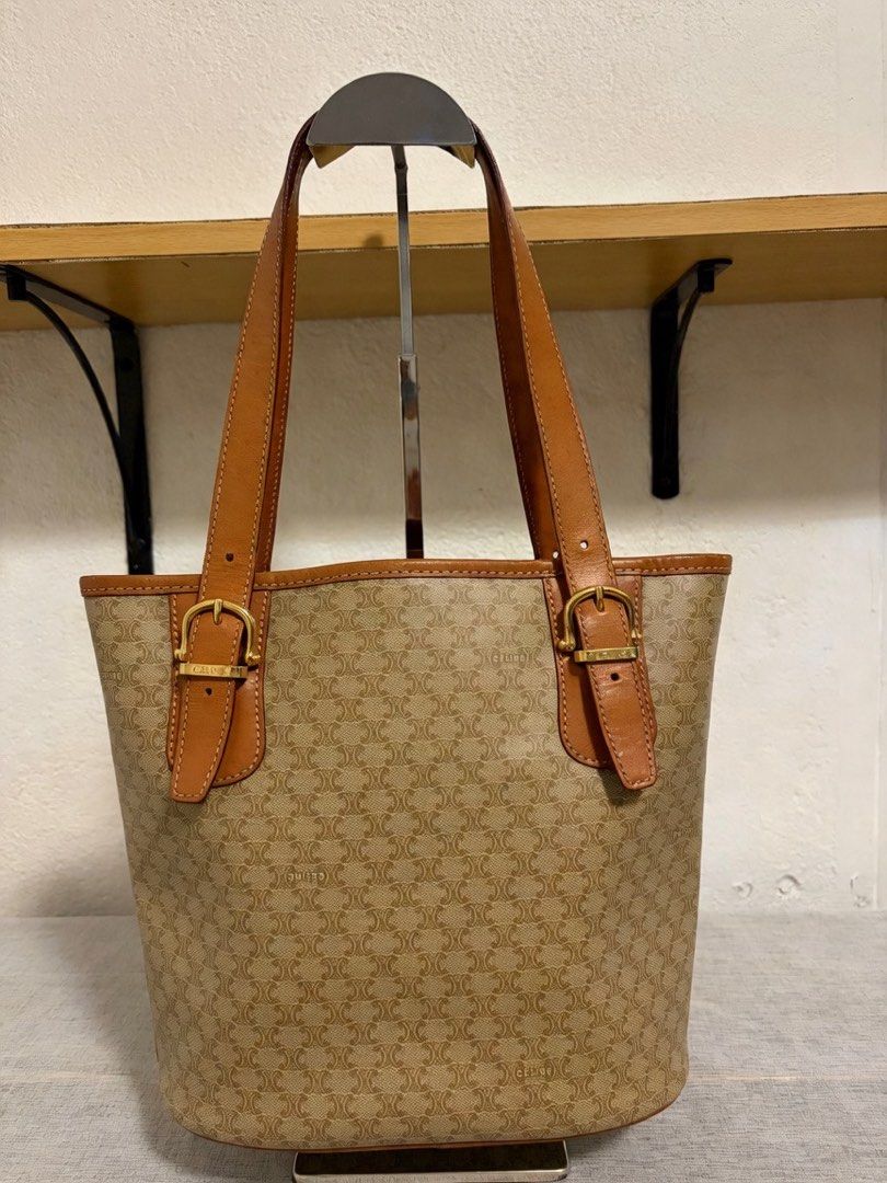 Authentic Celine Macadam Tote (Category: Announcements) located in Paoay. Submitted by ysmattic (Listing ID 1470954054, Image 2). Description: 100% guaranteed authentic Celine Macadam coated canvas tote in beige and brown colors. In excellent vintage condition..