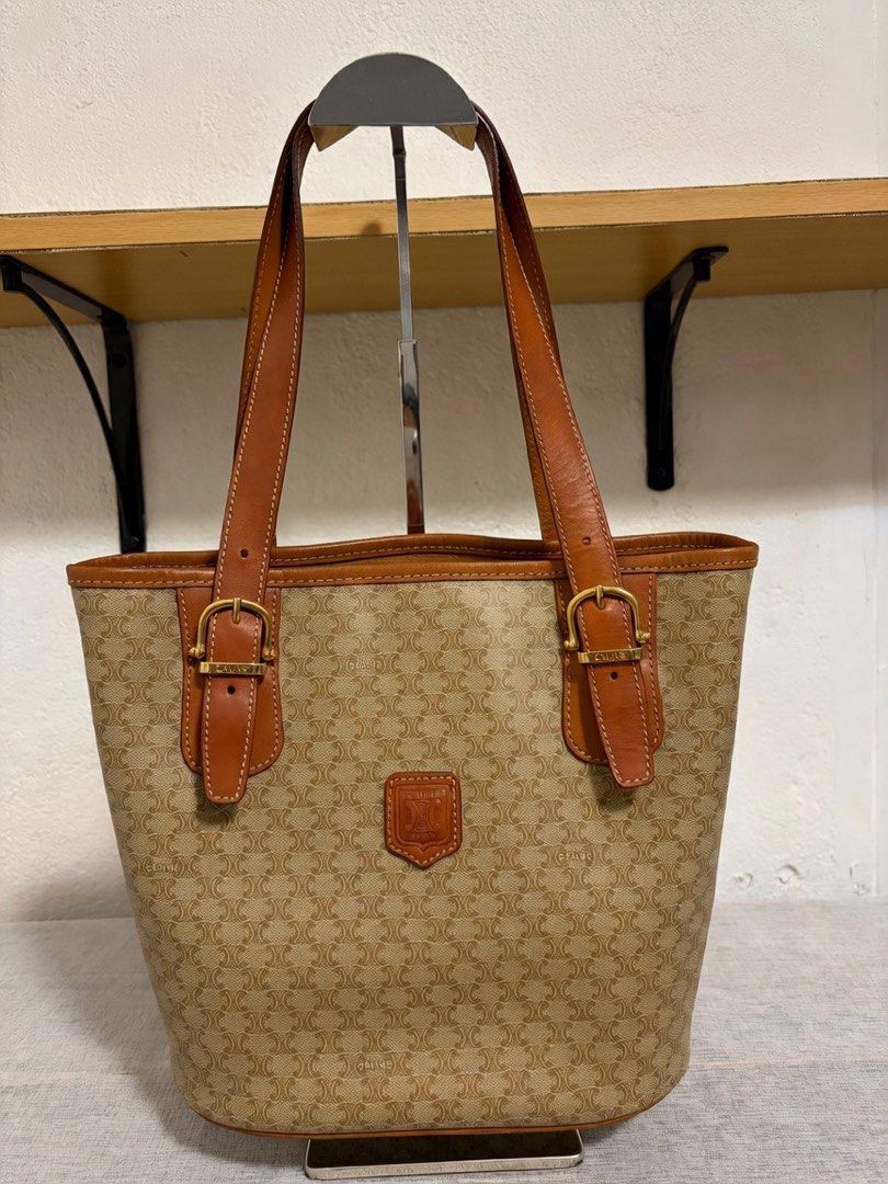 Authentic Celine Macadam Tote (Category: Announcements) located in Paoay. Submitted by ysmattic (Listing ID 1470954054, Image 1). Description: 100% guaranteed authentic Celine Macadam coated canvas tote in beige and brown colors. In excellent vintage condition..