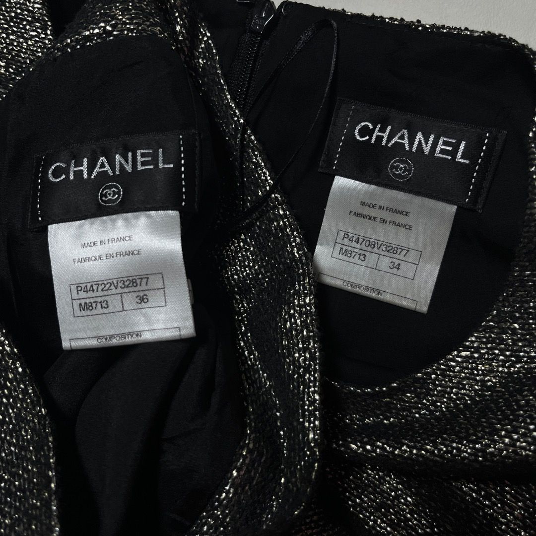 Authentic Chanel Metallic Black Two-Piece Skirt Set (Category: Sets or Coordinates) located in Caloocan City. Submitted by achilles_grails (Listing ID 1471056494, Image 3). Description: - Brand: Chanel - Type: Matching set (Short-sleeve top & wrap mini skirt) - Color: Metallic black with textured glitter finish - Details: Embellished button accents on the skirt - Origin: Made in France - Sizing: Top is Size 34, Skirt is Size 36 - Condition: Excel