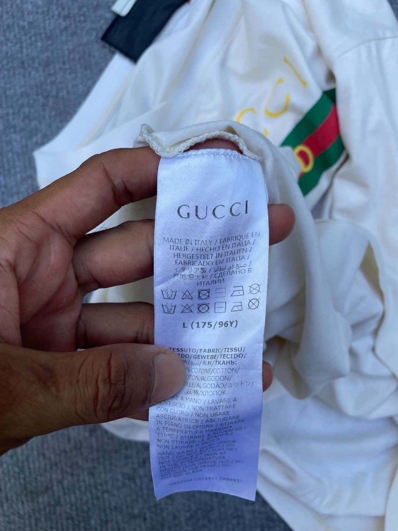 AUTHENTIC GUCCI BOTIQUE (Category: Luxury Apparel) located in Tacloban City. Submitted by solothriftfinds (Listing ID 1470962441, Image 3). Description: Authentic gucci botique shirt good condition need wash issue yellow stain.
