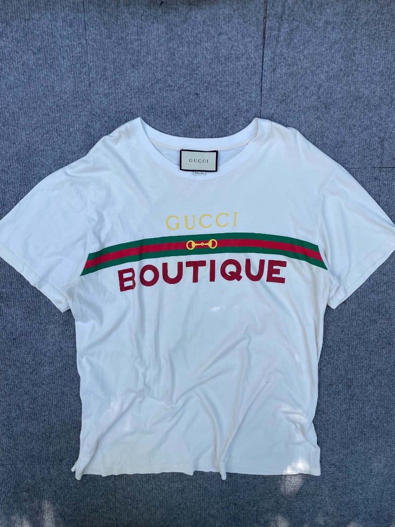 AUTHENTIC GUCCI BOTIQUE (Category: Luxury Apparel) located in Tacloban City. Submitted by solothriftfinds (Listing ID 1470962441, Image 1). Description: Authentic gucci botique shirt good condition need wash issue yellow stain.
