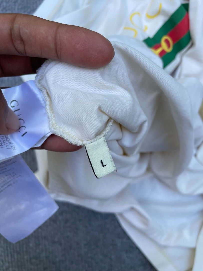 AUTHENTIC GUCCI BOTIQUE (Category: Luxury Apparel) located in Tacloban City. Submitted by solothriftfinds (Listing ID 1470962441, Image 2). Description: Authentic gucci botique shirt good condition need wash issue yellow stain.