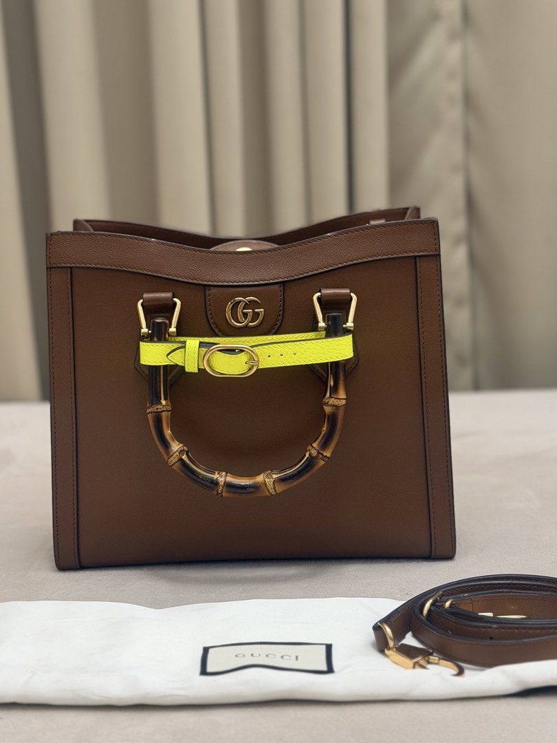 Authentic Gucci Diana Small Tote Bag (Category: Luxury Bags & Wallets) located in Manila. Submitted by maria_2326 (Listing ID 1470962557, Image 2). Description: Authentic w/dust bag, long sling, 2belts Location: Manila/QC.