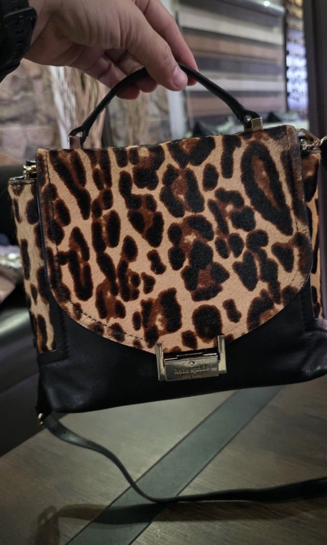 Authentic Kate Spade handbag (Category: Cross-body Bags) located in Apalit. Submitted by mjtwicedstyle_de_ap (Listing ID 1470978996, Image 3). Description: preloved Authentic Kate Spade handbag with provided sling in very good condition with normal signs of usage only leather/calf hair may rubs s calf hair s backpart,but not noticeable when worn ok pa rn nmn pls see photos.