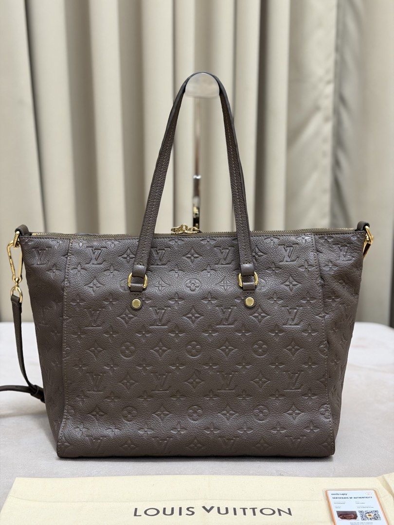 Authentic Louis Vuitton Monogram Empreinte Lumineuse PM size (Category: Luxury Bags & Wallets) located in Manila. Submitted by maria_2326 (Listing ID 1471081576, Image 2). Description: 💯% Authentic W/dust bag, long strap, entrupy, & free bag organizer Location: Manila/QC.