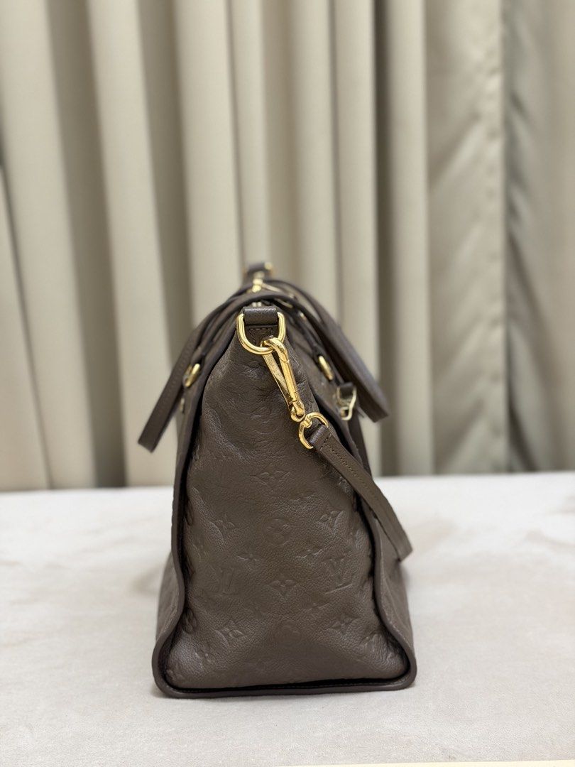 Authentic Louis Vuitton Monogram Empreinte Lumineuse PM size (Category: Luxury Bags & Wallets) located in Manila. Submitted by maria_2326 (Listing ID 1471081576, Image 3). Description: 💯% Authentic W/dust bag, long strap, entrupy, & free bag organizer Location: Manila/QC.