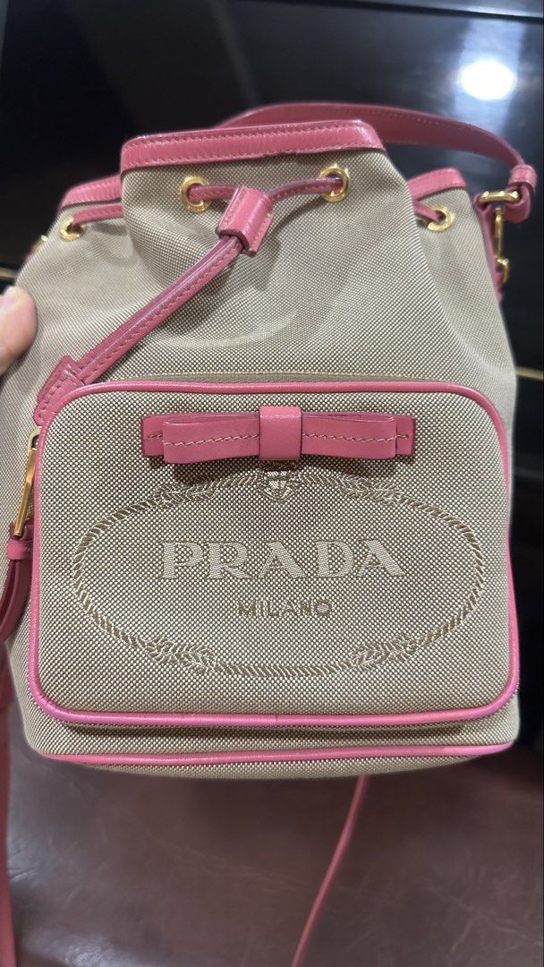 Authentic Prada Mini Bucket Two Way (Category: Luxury Bags & Wallets) located in Las Pinas. Submitted by marshmallowmax (Listing ID 1470969697, Image 2). Description: Guaranteed Authentic! Slightly used like 9/10 condition Clean inside and out With dustbag.