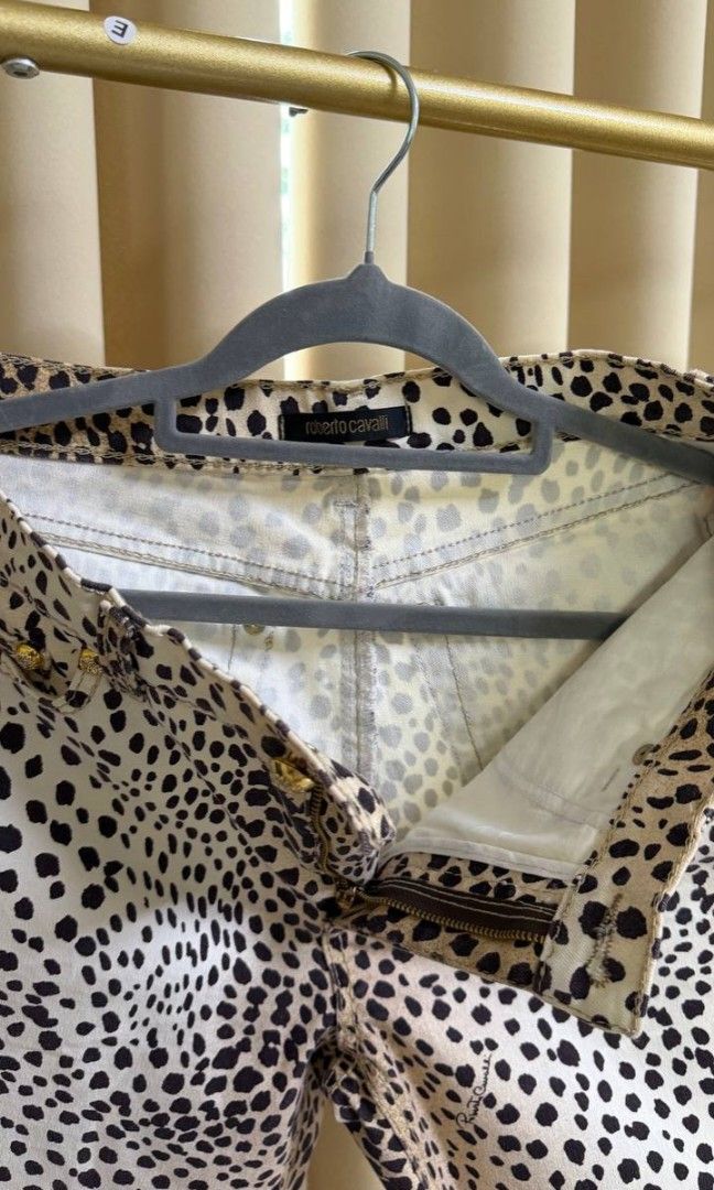 Authentic Roberto Cavalli Leopard Pants (Category: Luxury Apparel) located in Bacolod City. Submitted by declutteringofawhimsygirl (Listing ID 1471007794, Image 2). Description: Hearing offers not lower than 8k (php) • Rare find • Cropped straight-leg jeans • An all-over black-and-white leopard spot motif, accented by a contrasting brown leopard print pattern • Mid-rise fit, straight cropped-length leg • Detailed with a signature gold-tone hardwa
