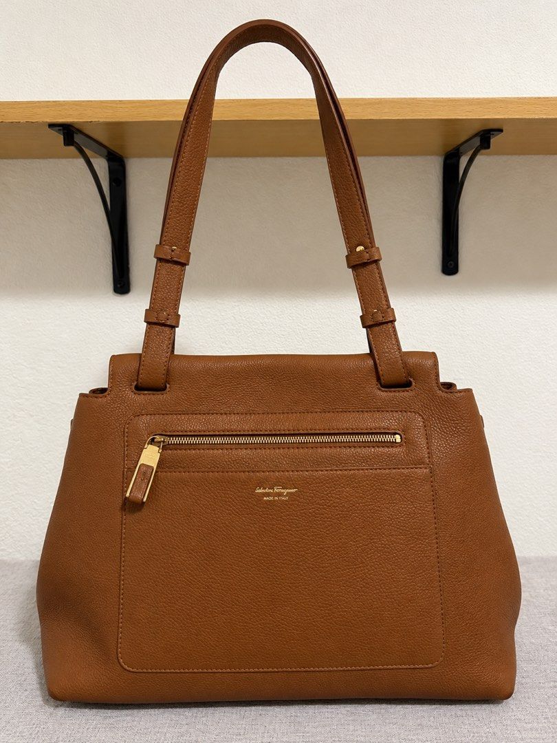 Authentic Salvatore Ferragamo Tote (Category: Luxury Bags & Wallets) located in Paoay. Submitted by ysmattic (Listing ID 1470955089, Image 2). Description: 100% guaranteed authetic Salvatore Ferragamo Ginger tote in tan, grained leather. In very good condition! .