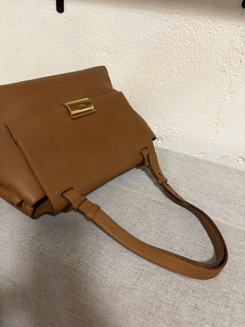 Authentic Salvatore Ferragamo Tote (Category: Luxury Bags & Wallets) located in Paoay. Submitted by ysmattic (Listing ID 1470955089, Image 3). Description: 100% guaranteed authetic Salvatore Ferragamo Ginger tote in tan, grained leather. In very good condition! .