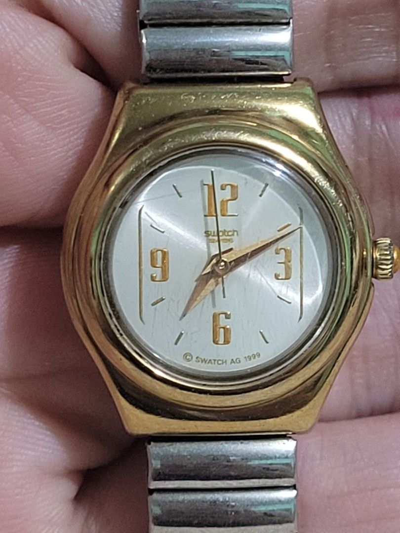 AUTHENTIC SWATCH IRONY LADY "Reverence" WATCH (Category: Luxury Watches) located in Makati City. Submitted by juriexpi (Listing ID 1470932388, Image 3). Description: AUTHENTIC SWATCH IRONY LADY "Reverence" WATCH - in very good working condition, authentic vintage Swatch Swiss watch, what you seet is what you get, fits small to medium wrist Model: Swatch Irony Lady "Reverence" Reference Code YSS104G Release Year 1996 (Fall/Winter Collection) Case 