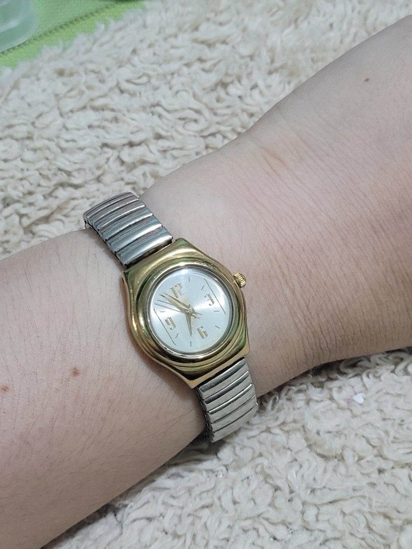 AUTHENTIC SWATCH IRONY LADY "Reverence" WATCH (Category: Luxury Watches) located in Makati City. Submitted by juriexpi (Listing ID 1470932388, Image 2). Description: AUTHENTIC SWATCH IRONY LADY "Reverence" WATCH - in very good working condition, authentic vintage Swatch Swiss watch, what you seet is what you get, fits small to medium wrist Model: Swatch Irony Lady "Reverence" Reference Code YSS104G Release Year 1996 (Fall/Winter Collection) Case 