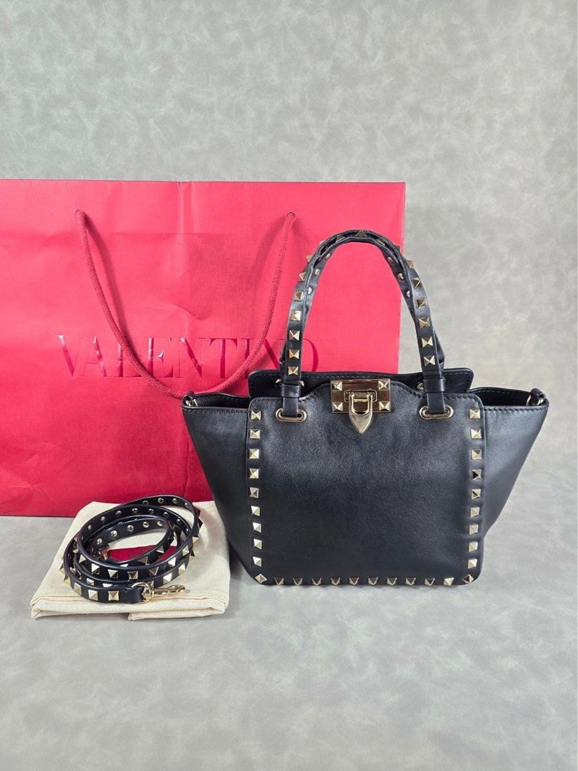 Authentic Valentino Rockstud Mini Tote Bag (Category: Luxury Bags & Wallets) located in Makati City. Submitted by luxchelry (Listing ID 1471060191, Image 1). Description: Rockstud Mini Tote Bag ♦️Comes with strap, dustbag and paperbag ♦️9.5/10 ♦️Any discoloration is due to lighting only. ✨️P21000✨️ 📍Makati We accept payments thru BDO, BPI and PAYPAL. We can ship thru Grab, Lalamove, LBC and JRS Express. All items are 100% authentic. We offer mon