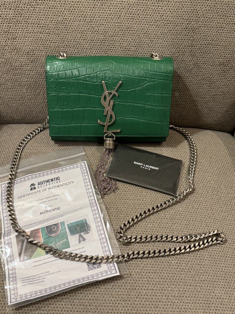 Authentic Ysl (Category: Luxury Bags & Wallets) located in Manila. Submitted by chloe_luxuries (Listing ID 1471086856, Image 1). Description: Guaranteed Original Ysl Kate Tassel shoulder bag in green crocodile embossed leather with silver-tone hardware Still in very good condition Comes with card and COA Pm for those interested .