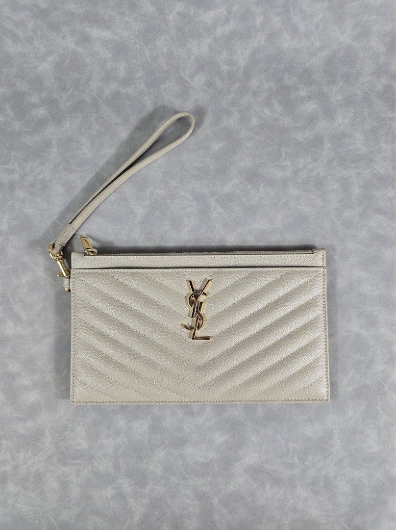 Authentic YSL pouch (Category: Luxury Bags & Wallets) located in Makati City. Submitted by luxchelry (Listing ID 1471059883, Image 2). Description: Pouch Monogram de Poudre Beige ♦️Comes with receipt, authenticity card, carecards, dustbag and box ♦️9.5/10 ♦️Any discoloration is due to lighting only. ✨️P18000✨️ 📍Makati We accept payments thru BDO, BPI and PAYPAL. We can ship thru Grab, Lalamove, LBC and JRS Express. All items are 100% authentic. 