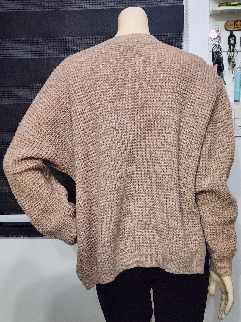 B-4 Cozy Beige Waffle-Knit Sweater ✨ (Category: Coats, Jackets and Outerwear) located in Tanza. Submitted by wearitagainph (Listing ID 1471015532, Image 3). Description: Relaxed, comfortable, and chic! Features a notched split neckline, waffle knit texture, and a handy front patch pocket—perfect for effortless everyday style. * Bust: 52" * Length: 23" * Color: Beige / Taupe * Condition: Excellent DM to order or inquire!.