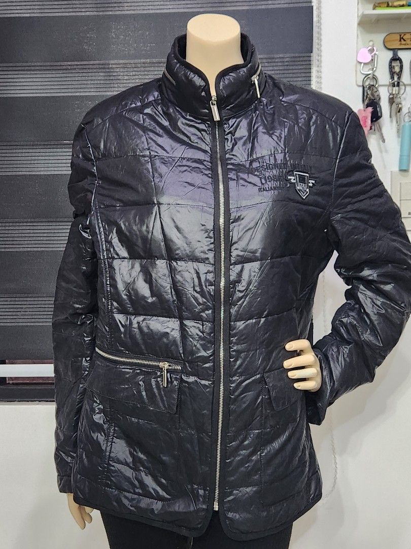 B-5 Puffer Sleek Black Quilted Padded Jacket ✨ (Category: Others Tops) located in Tanza. Submitted by wearitagainph (Listing ID 1471016376, Image 3). Description: Lightweight yet warm and stylish! Features a high neck collar, full front zipper, quilted stitching, and zippered pockets—perfect for cool weather and travel. * Bust: 42" * Length: 27" * Color: Black * Condition: Excellent DM to order or inquire!.