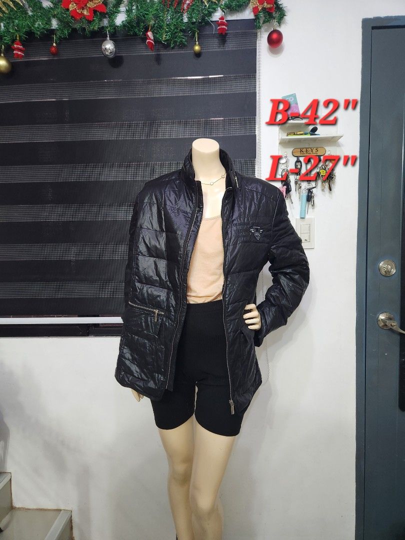 B-5 Puffer Sleek Black Quilted Padded Jacket ✨ (Category: Others Tops) located in Tanza. Submitted by wearitagainph (Listing ID 1471016376, Image 1). Description: Lightweight yet warm and stylish! Features a high neck collar, full front zipper, quilted stitching, and zippered pockets—perfect for cool weather and travel. * Bust: 42" * Length: 27" * Color: Black * Condition: Excellent DM to order or inquire!.