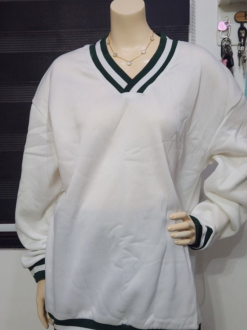 B-7 Preppy White V-Neck Pullover Sweater ✨ (Category: Coats, Jackets and Outerwear) located in Tanza. Submitted by wearitagainph (Listing ID 1471018280, Image 2). Description: Sporty, stylish, and super versatile! Features a crisp white fabric accented with classic dark green and white striped ribbed trim along the V-neck, cuffs, and hem—perfect for a preppy, varsity-inspired look. * Bust: 48" * Length: 29" * Color: White / Green Trim * Condition