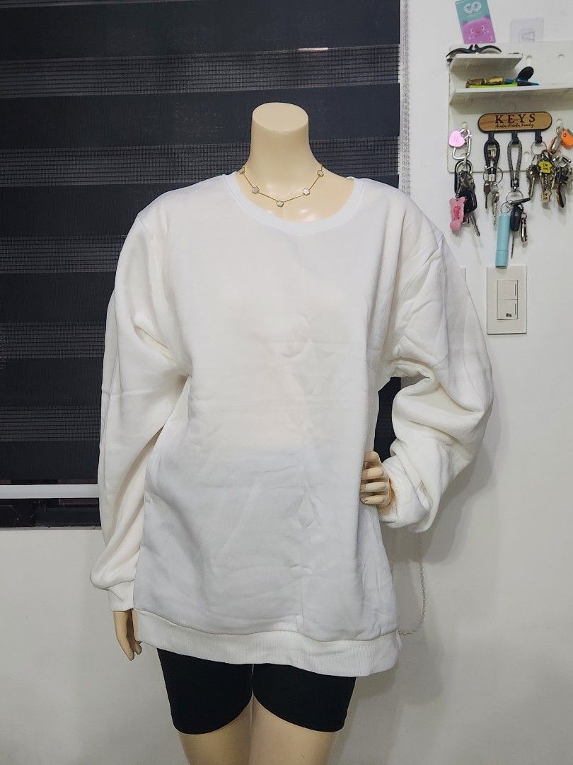 B-9 Classic White Crewneck Sweatshirt ✨ (Category: Coats, Jackets and Outerwear) located in Tanza. Submitted by wearitagainph (Listing ID 1471020226, Image 2). Description: Clean, minimal, and versatile! Features a classic crew neckline, ribbed cuffs and hem, and a comfy relaxed fit—a must-have essential for easy layering and everyday wear. * Bust: 48" * Length: 28" * Color: White * Condition: Excellent DM to order or inquire!.