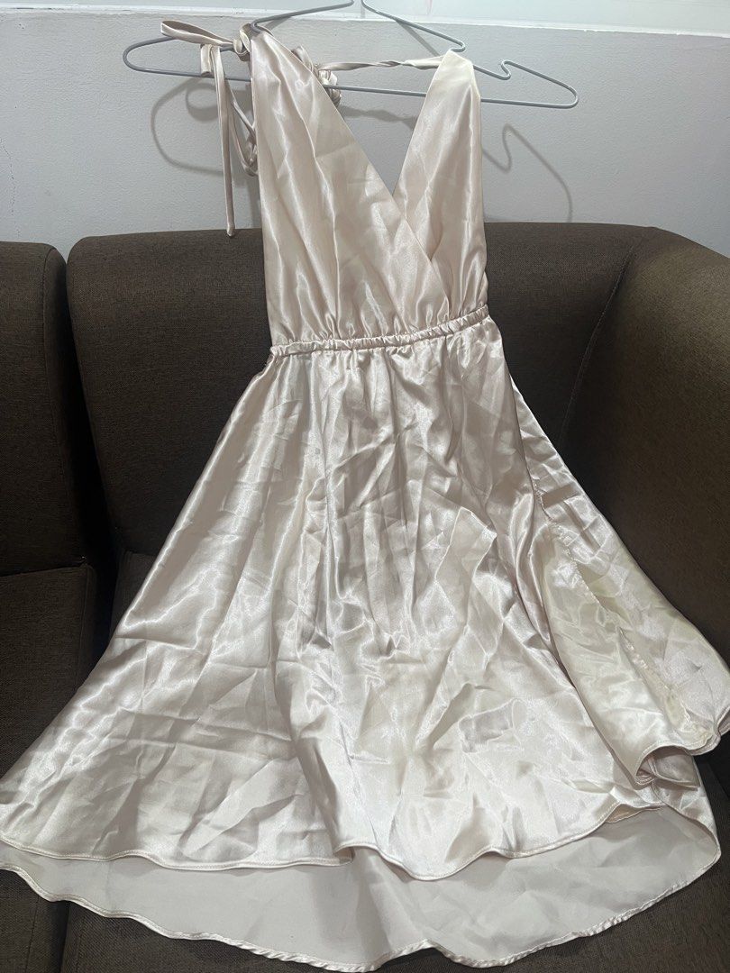 white gold satin dress (Category: Evening dresses & gowns) located in Rizal. Submitted by sheshells.gem (Listing ID 1470937598, Image 3). Description: backless xs - s color: cream material: smooth / glossy / satin condition: worn once for a few hours / properly stored like new best for formal events, dinners parties and dates.
